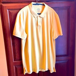 Men’s XL yellow shirt sleeve polo shirt. New, never worn